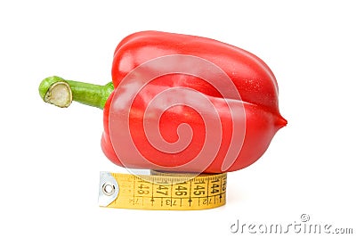 A red pepper and measuring tape Stock Photo