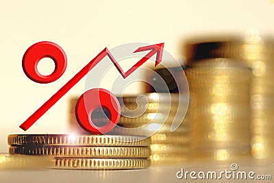 Red percent sign on a background of money . Stock Photo