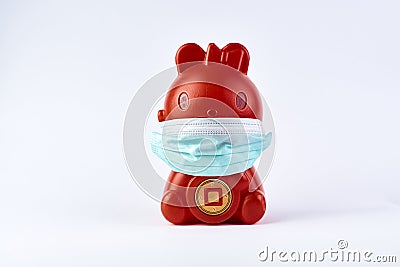 Red Piggy bank wear medical mask isolated on white Stock Photo