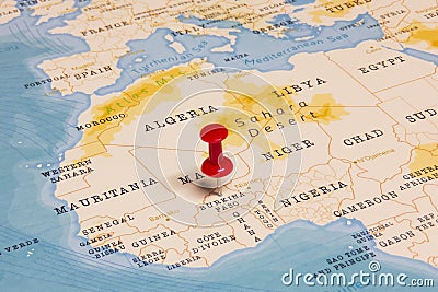 A Red Pin on Burkina Faso of the World Map Stock Photo