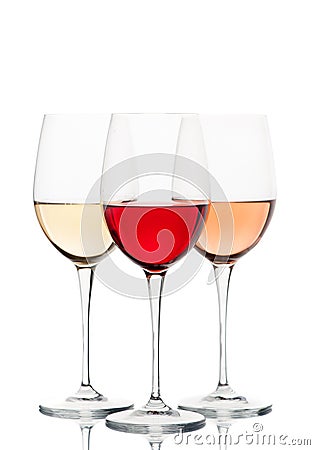 Red, pink and white wine in glasses Stock Photo