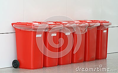 Red plastic bins Stock Photo