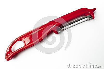 Red plastic potato peeler Stock Photo