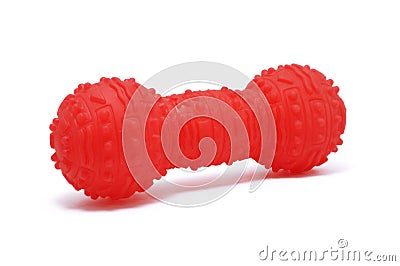 Red Plastic Squeaky Dog Chew Toy Stock Photo