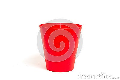 Red plastic trashcan Stock Photo