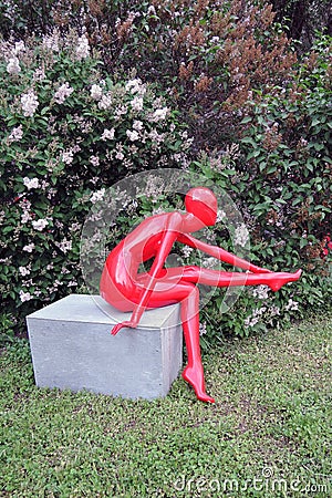 Red plastic woman sculpture. Arch Moscow 2015 Editorial Stock Photo