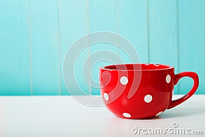 Red polka dot coffee mug Stock Photo