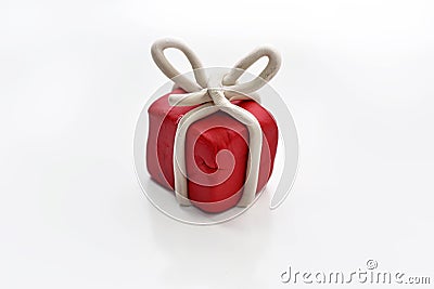 Red present made from plasticine. Stock Photo