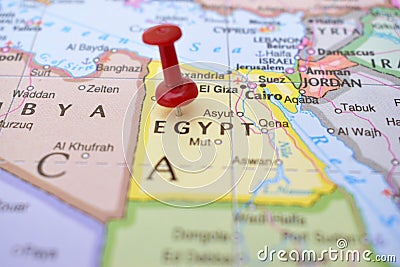 Red Push Pin Pointing Egypt on Location of World Map Close-Up View Stock Photo