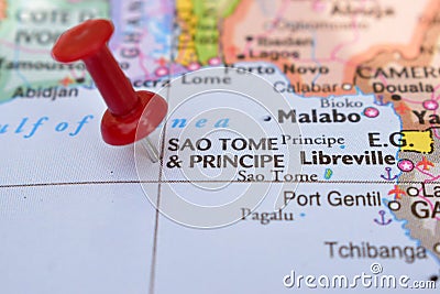 Red Push Pin Pointing on Location of World Map Close-Up View Stock Photo