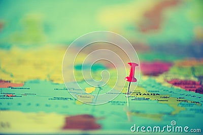 Red pushpin, thumbtack, pin showing the location, travel destination point on map. Copy space, lifestyle concept Stock Photo