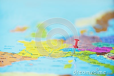 Red pushpin, thumbtack, pin showing the location, travel destination point on map. Copy space, lifestyle concept Stock Photo