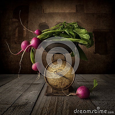Red radish with a small vintage scale photography Stock Photo