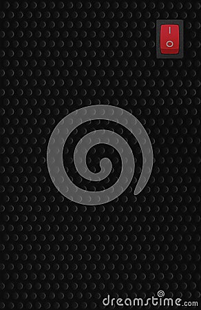 Red rectangle rocker power switch in on position, black abstract dot texture frame pattern, natural blank empty copy space Stock Photo