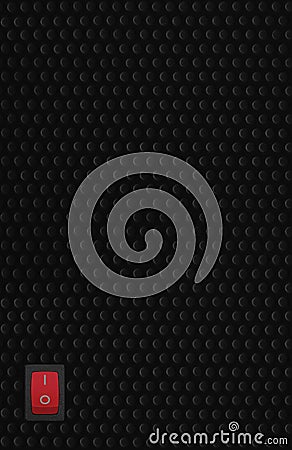 Red rectangle rocker power switch in on position, black abstract dot texture frame pattern, natural blank empty copy space Stock Photo