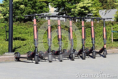 Red Rental Scooters by Voi in Downtown Helsinki, Finland Editorial Stock Photo