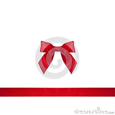 Red ribbon bow on white background. Stock Photo