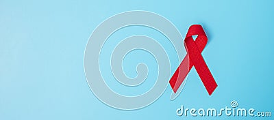 Red Ribbon for supporting people living and illness. Healthcare and safe sex concept. December World Aids Day and multiple myeloma Stock Photo