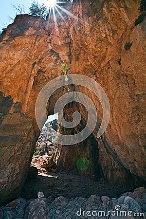 Red rock formation in the cleft of Imbros Stock Photo