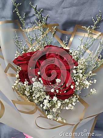 Red rose bouquet love valentines anniversary baby breath gift Stock Photo
