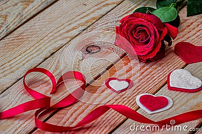 Red rose with ribbon and heart Stock Photo