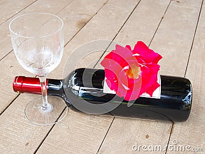 Red roses and red wine Stock Photo