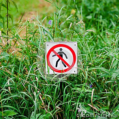 Red round prohibition sign with a black silhouette of a man crossed out Stock Photo