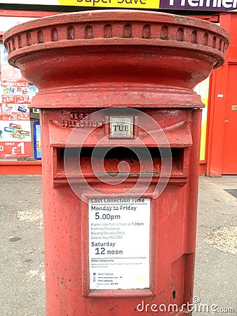 A red Royal Mail post box Editorial Stock Photo