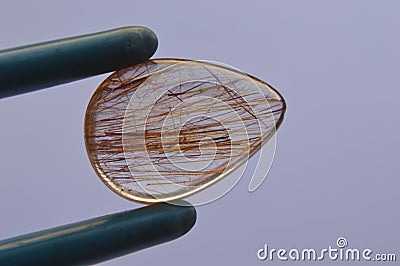 Red Rutilated Quartz Cabochon beautifully polished from Pakistan Stock Photo