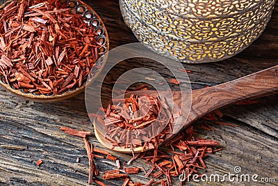 Red sandalwood on a spoon Stock Photo