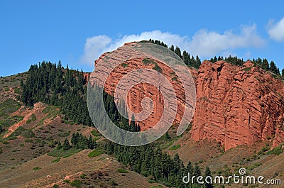 Red sandstone rock formations Seven bulls and Broken heart, Jeti Oguz canyon in Kyrgyzstan,Issyk-Kul region,Central Asia Stock Photo