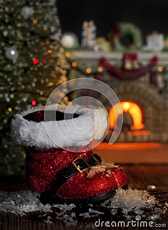 Red Santa Boots Melting Snow Stock Photo