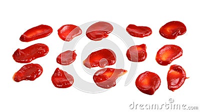 Red sauce splashes isolated on white background. Ketchup Stock Photo