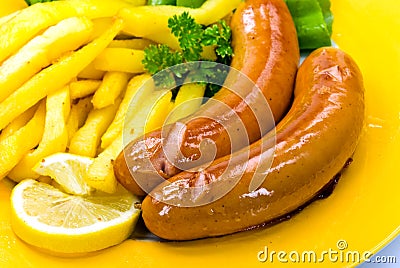 Red sausage-roasted with deep fried- french fries Stock Photo