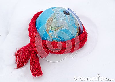 Red scarf earth globe sphere winter snow concept Stock Photo