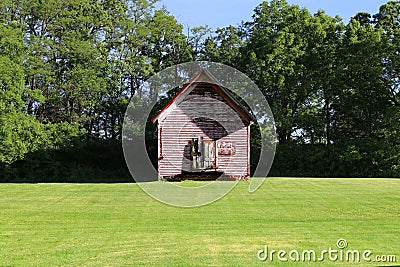 Red school house abandoned empty rural schoolhouse building historic old vintage prairie countryside home Stock Photo