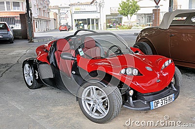 A red Secma sports car on a parking Editorial Stock Photo