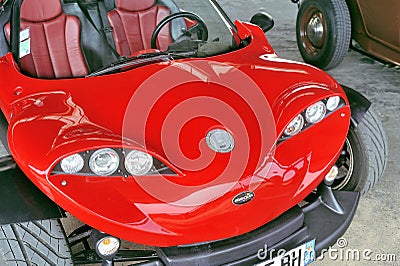 A red Secma sports car on a parking Editorial Stock Photo