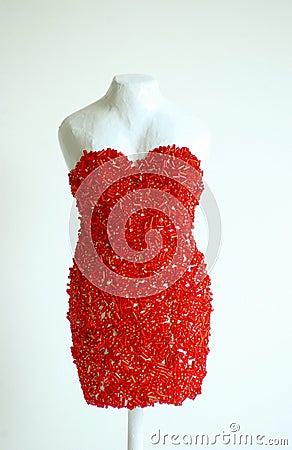 Red sequined dress form Stock Photo