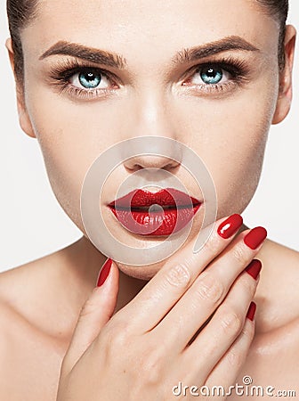 Red Lips and Nails closeup. Open Mouth. Stock Photo