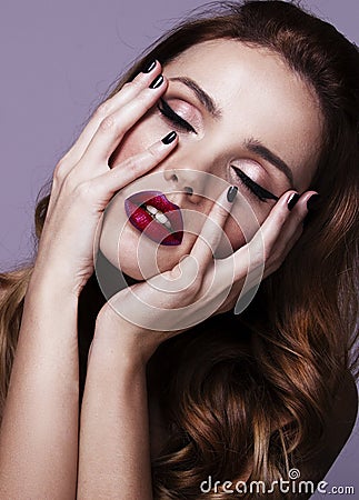 Red Lips and Nails closeup. Open Mouth. Stock Photo