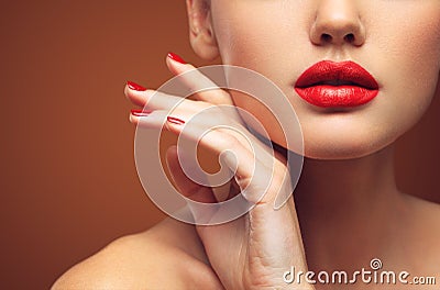 Red Lips and Nails closeup. Open Mouth. Manicure and Makeup. Make up concept. Stock Photo