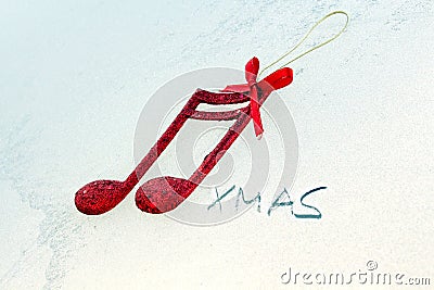 Red shiny decorative christmas music notes Stock Photo