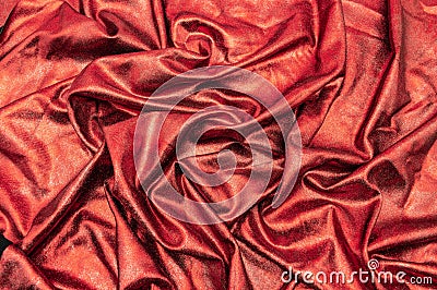 Red shiny fabric drape new year texture Christmas Stock Photo