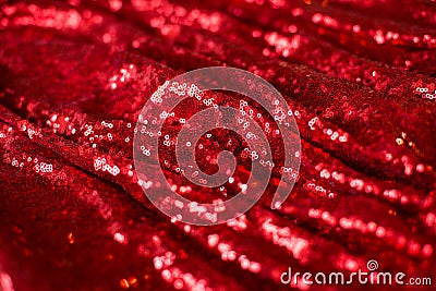 Red shiny fabric with pleats laid out Stock Photo