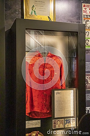 A red shirt worn by Johnny Cash on display inside of the Johnny Cash Museum in Nashville Tennessee Editorial Stock Photo