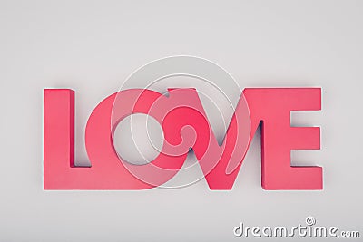 Red sign LOVE. Valentine day concept. Trendy minimalistic flat l Stock Photo