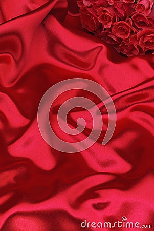 Red silk and roses Stock Photo