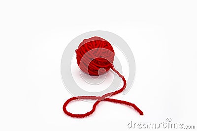 Red skein of thread against white background. Red ball of wool red thread isolated on white Stock Photo