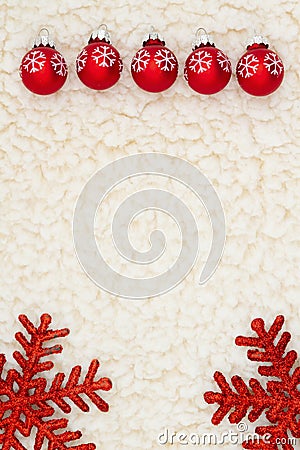 Red snowflakes ornaments Christmas and snowflake background on beige sherpa material Stock Photo